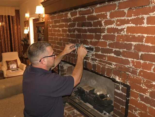 Bexley Chimney Sweep expert fixing a fireplace in Bexley, OH